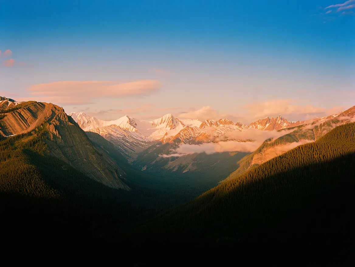 Mountain Vista - Panoramic view of snow-capped peaks and valleys